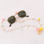 Alegres brazaletes, pulseras tobillera y cordones para gafas adornados con borlas para este verano