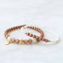 Preciosos pendientes y pulseras en colores c&aacute;lidos con abalorios Polaris Elements