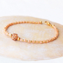 Elegantes pendientes y pulseras con los abalorios faceteados cubo