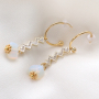 Pendientes y pulseras de tendencia con colgantes y entrepiezas con zirconia: