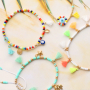 &iexcl;Manos a la obra con las borlas mini para crear las mejores pulseras y tobilleras!