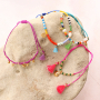 As&iacute; se incorporan las borlas a pulseras y cordones para gafas de sol