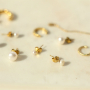 Pagina titel inspiratie: C&oacute;mo presentar los pendientes de acero inoxidable con perlas de agua dulce