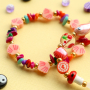 &iexcl;D&eacute;jate inspirar! Crea pulseras de abalorios con un toque alegre.