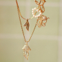 Crea bonitos collares y anillos con colgantes met&aacute;licos TQ de lat&oacute;n
