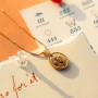 Dise&ntilde;a joyas &uacute;nicas con dijes de acero inoxidable con n&uacute;meros de &aacute;ngeles