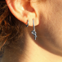 Momento de inspiraci&oacute;n con pendientes de acero inoxidable