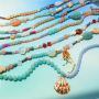 Crea coloridos collares con abalorios redondos de cristal