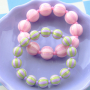 Crea joyas coloridas con abalorios acr&iacute;licos DQ con rayas